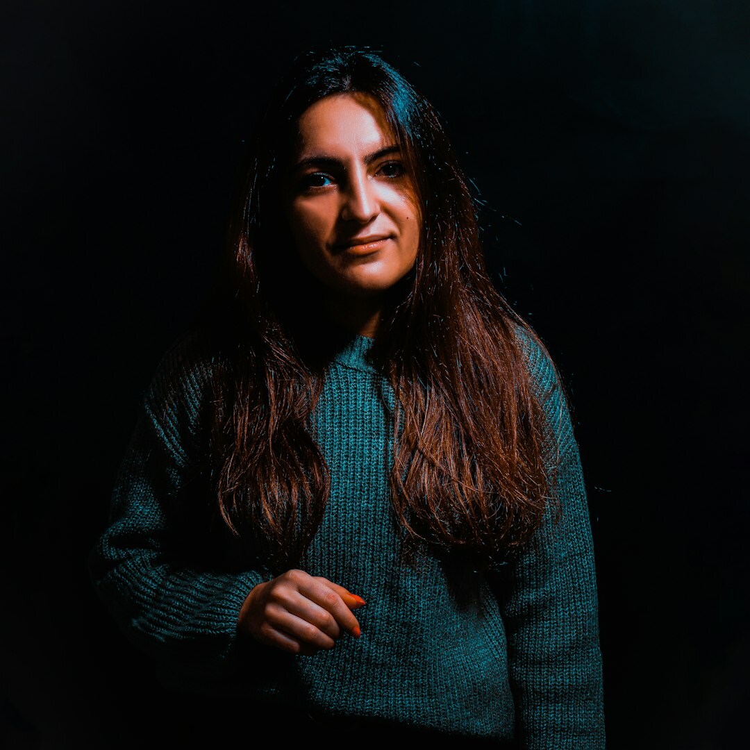 Professional Irish woman in business attire against neutral background
